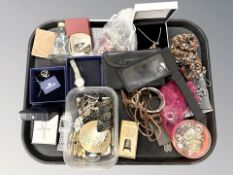 A quantity of costume jewellery, some silver items, jeweler's magnifier, a miser's purse,
