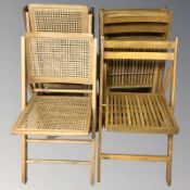 Ten various folding chairs.