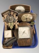 A cuckoo clock, barometer, two Metamec mantel clocks and a Smith's alarm timepiece.