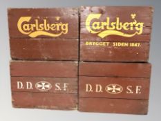 Two vintage painted pine Carlsberg bottle crates plus two others, width 46 cm.