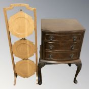 A reproduction mahogany three drawer low chest,