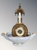 A carved beech barometer and a Sadler lustre twin handled centrepiece.
