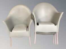 A set of four moulded plastic armchairs,