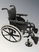 A folding wheelchair.