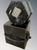 An early 20th century twenty four button concertina,