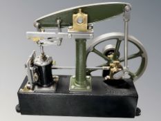 A Stuart live steam piston engine, 35 cm L x 18 cm W x 29 cm H.