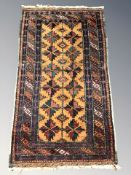 A Balouch rug, Afghanistan, 104 cm x 58 cm.