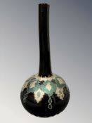 A large Continental glass bottle vase with overlay decoration,