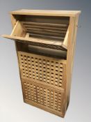 A sheesham wood shoe cabinet, width 55 cm.