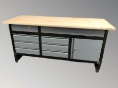 A contemporary pine and enameled metal storage sideboard / work bench, 171 cm x 60 cm x 84 cm.