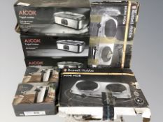 A group of boxed kitchen appliances.