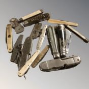 A group of antique / vintage folding knives, Swiss army style knife, etc.