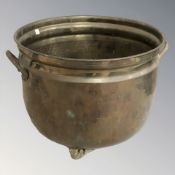A brass twin handled planter, height 24 cm.