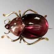 A gold and synthetic stone beetle brooch,