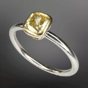 Tiffany & Co : A platinum and 18ct yellow gold diamond solitaire ring,
