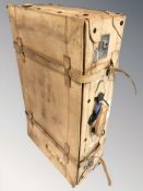 A tan leather luggage case,