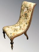 A 19th century walnut lady's salon chair