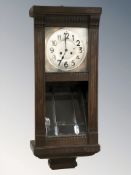 Two early 20th century continental wall clocks.