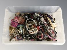 A large quantity of modern costume necklaces, bangles, etc.