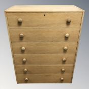 A 20th century Danish oak veneered six drawer chest, 76 cm x 38 cm x 98 cm.