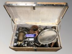 A vintage trunk containing a large quantity of metal wares including EPNS, brass and copper wares,