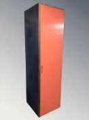 A plywood single door cabinet, 56 cm x 62 cm D x 210 cm H.