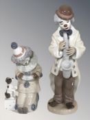 A Lladro clown saxophonist No. 5471 and a further clown boy with squeeze box No. 5279.
