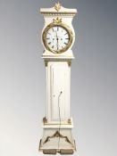 A 19th century Continental painted and gilt longcased clock, pendulum and two weights,