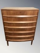 A 20th century Danish teak and MDF bow front six drawer chest, 80 cm W x 45 cm D x 110 cm H.