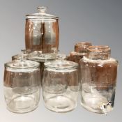 Seven various lidded glass storage / confectionary jars, tallest 32 cm.