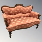 An early 20th century walnut salon settee,