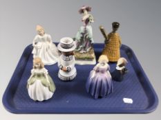 Seven assorted porcelain and pottery figures of ladies including Royal Doulton, etc.