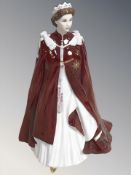 A Royal Worcester figure in celebration of the Queen's 80th birthday 2006, height 23 cm.