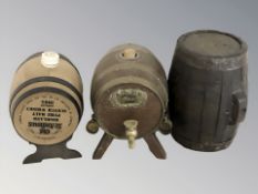 Two miniature oak kegs, one marked 'Gin', and a further plastic keg.