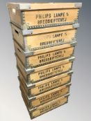 Seven stackable plywood crates with metal mounts, length 48 cm.