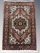 A Tabriz rug, North-West Iran, 83 cm x 53 cm.