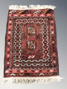 A Turkoman rug, Afghanistan, 83 cm x 52 cm.