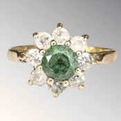 A 9ct gold synthetic emerald cluster ring, size N.