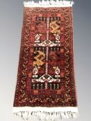 A Turkoman rug, Afghanistan, 116 cm x 50 cm.