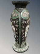 A decorative mosaic pottery triangular section vase, height 75 cm.