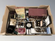 A box of assorted costume jewellery including dress rings, necklaces, earrings, etc.