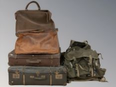 A group of vintage luggage cases, doctor's bag,
