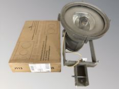 A spotlight and a ceramic cooker top in box