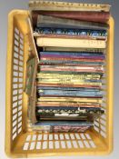 A quantity of Ladybird books and other volumes.