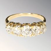 An 18ct gold five-stone old-cut diamond ring, the total diamond weight estimated at 1.
