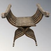 A 19th century Syrian carved hardwood and mother of pearl inlaid savonorala, width 61 cm.