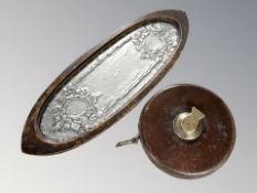 An Arts & Crafts pewter oval tray in wooden surround, length 33cm,