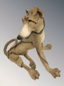 A Mutts 'A breed apart' model of a seated greyhound, height 30 cm.