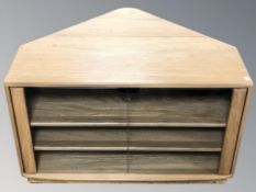 An Ercol light elm glazed double door entertainment cabinet, 91 cm W x 71 cm D x 55 cm H.