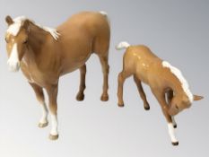A Beswick palomino horse and foal,
